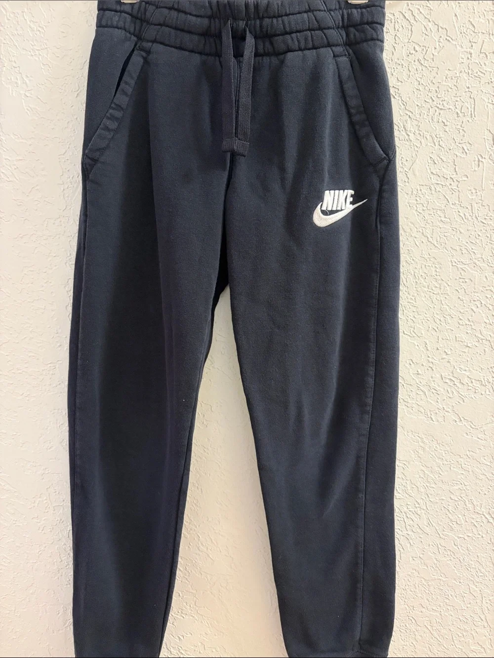 Nike Kids Black Sweatpants with White Swoosh